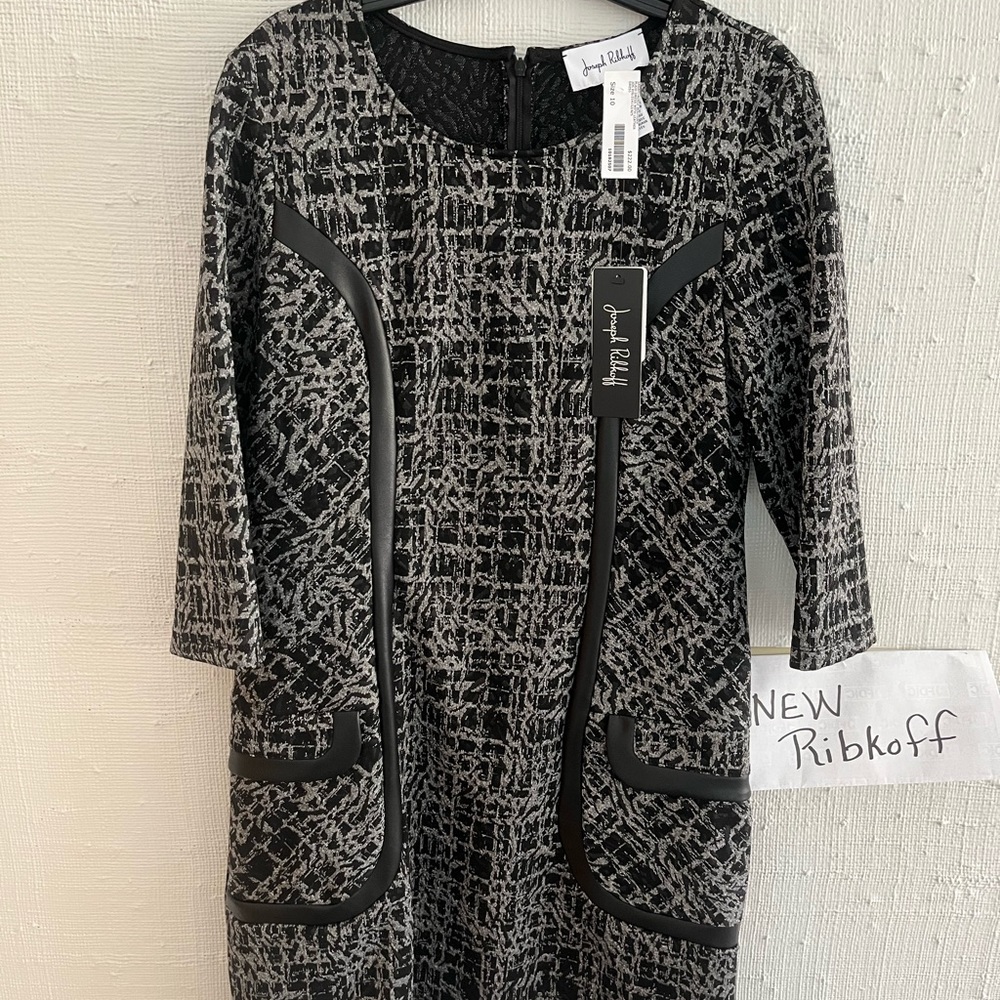 New Joseph Ribkoff dress with tags. 3/4 sleeves with leather trim.  Classic look